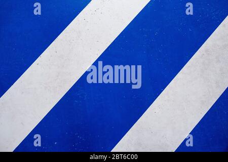 Blue and white colored safety lines textured background. Stock Photo