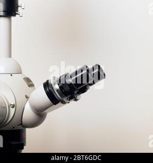 Research binocular microscope in a laboratory Stock Photo