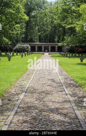 Sidewalk next to headstones at the Sandweiler German war cemetery in Luxembourg. Stock Photo