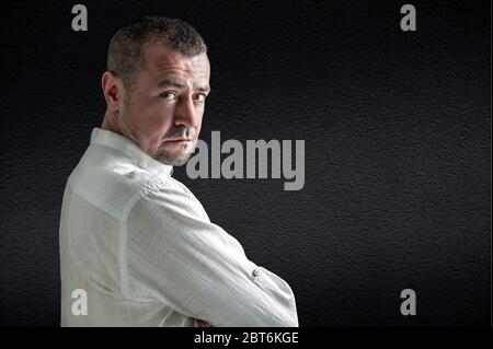 Portrait of a bearded man on a dark background. Lifestyle and people concept Stock Photo