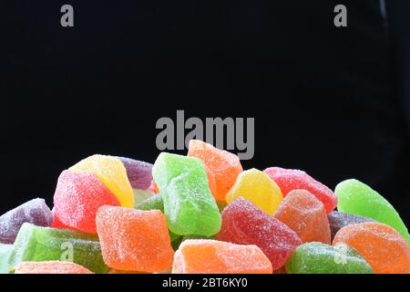 Colorful jelly candies against dark background Stock Photo