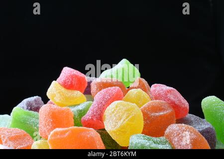 Colorful jelly candies against dark background Stock Photo