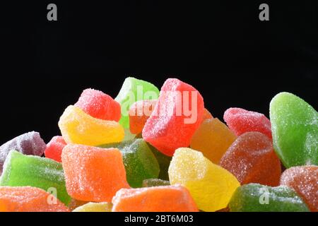 Colorful jelly candies against dark background Stock Photo