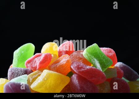 Colorful jelly candies against dark background Stock Photo