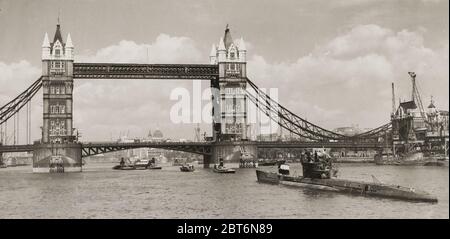 World War II vintage photograph -  captured German U boat U776 passes under Tower Bridge London Stock Photo