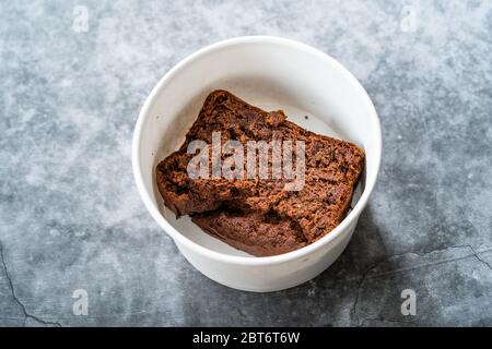 Take Away Healthy Organic Homemade Vegan Dessert Mexican Brownie with Kidney Beans. Gluten Free and No Sugar Free in Plastic Box Package Container. Re Stock Photo