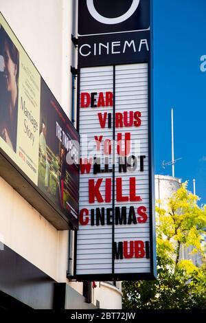 22 May 2020 London, UK - Sign on the facade of Rio Cinema, Dalston, Hackney saying 'Dear Virus You Will Not Kill Cinemas, Mubi' during the Coronavirus pandemic lockdown Stock Photo