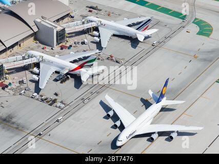 Multiple Airbus A380 parked at TBIT Terminal in LAX. Biggest passenger aircraft together. Air France, Lufthansa and Emirates A380-800 super jumbo.