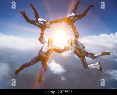 Four Skydivers in Formation Stock Photo