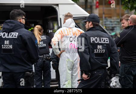 Berlin Germany 23rd May Police Officers Arrest A Participant Of A Demonstration Of A Group Yellow West With The Title Home And World Peace At The Grosser Stern This Saturday The