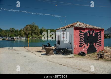 Impressions of Butrint cable ferry building in Vivari Channel, Southern ...