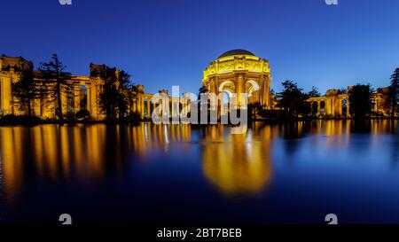 The Palace at night reflected in the water Stock Photo