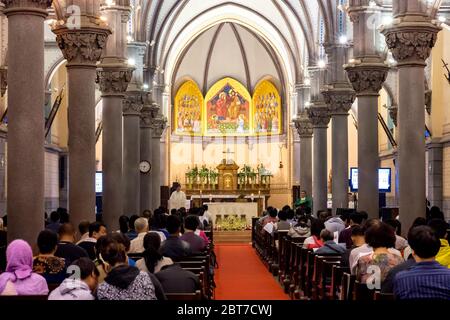 Beijing / China - October 4, 2015: Sunday mass in the Church of Our Lady of Mount Carmel (Xizhimen Church), Roman Catholic Church in Beijing, China Stock Photo