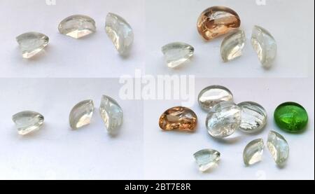 broken glass transparent stones on a white background. set of shards Stock Photo