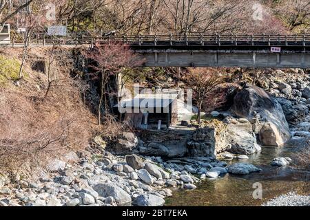 Takayama, Japan - April 6, 2019: Hot springs steam flowing through pipes in Gifu Prefecture in hot springs onsen resorts in Okuhida Villages and Shinh Stock Photo