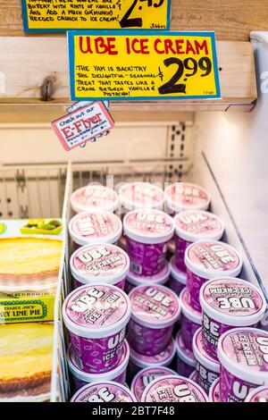Reston, USA - May 7, 2020: Inside Trader Joe's grocery store shop with refrigerator with ube yam potato flavored ice cream on retail display with pric Stock Photo