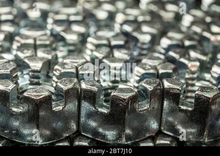 abstract background from hexagonal screw nuts Stock Photo