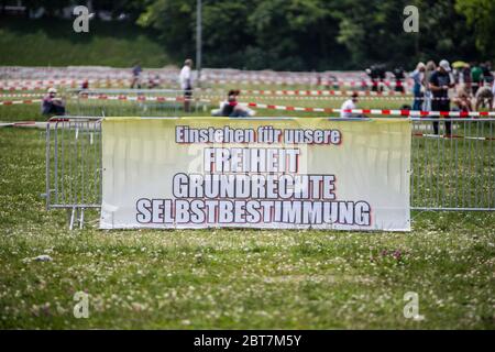 Munich, Bavaria, Germany. 23rd May, 2020. ''Freedom, basic rights, and self-determination''. After days of back and forth wrangling with the Munich Kreisverwaltungsreferat, the organizers of the so-called 'Hygiene Demo'' in Munich were again granted permission for 1,000 distanced participants inside the demo area only to have torrential downpours and dangerous winds cause a cancellation for the 500 that arrived.Further being criticized by politicians, civic groups and healthcare workers are the words of 'no violence'' for the previous demo as a marker of success while some 2,500 unmasked Stock Photo