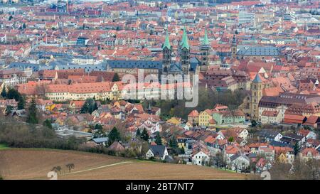 Skyline / Cityscape of Bamberg with Bamberger Dom (cathedral; in the middle) and Karmelitenkloster (carmelite monastery; on the right). Aerial view. Stock Photo