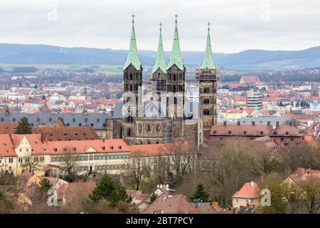 View on the four towers of Bamberg Cathedral (Bamberger Dom). Seen from the distance. Medieval building which combines gothic and romanesque elements. Stock Photo