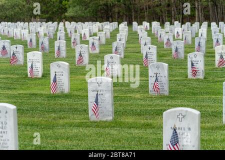 Riverhead, United States. 23rd May, 2020. View of Calverton National Cemetery for veterans during Memorial Day weekend amid COVID-19 pandemic in Long Island. Veterans of all confessions Christians, Jewish, Muslim buried on this cemetery. Veterans of all wars have been buried there. (Photo by Lev Radin/Pacific Press) Credit: Pacific Press Agency/Alamy Live News Stock Photo