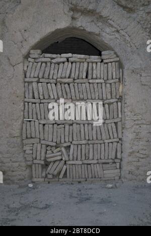 bricks piled in a doorway, Arg e bam citadel, Bam, Iran Stock Photo