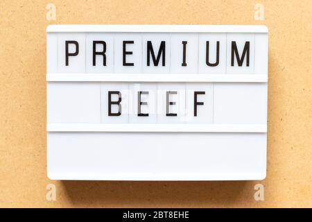 Lightbox with word premium beef on wood background Stock Photo