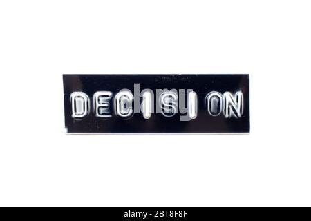 Embossed letter in word decision in black banner on white background Stock Photo