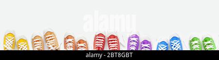Colorful bright sneakers on a white background. Stock Photo