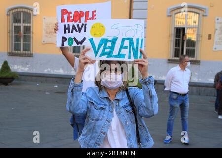 A woman shows her protest cartel to the flash mob organized by the association Aquamunda for the protection of the river Sarno . Stock Photo