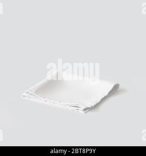 white napkin isolated on light grey background Stock Photo