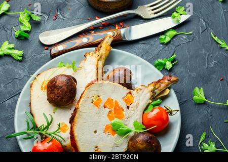 Pork loin or roasted rack of pork with vegetable.Grilled meat Stock Photo