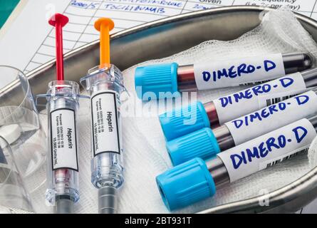 heparin medication for covid-19 patients with elevated blood dimero-D, conceptual image, unbranded generic drug containers and hypothetical bar codes Stock Photo
