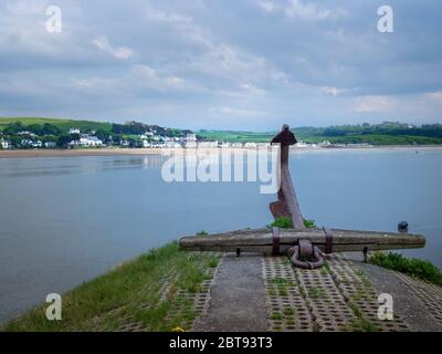 Instow town viewed from the quay at Appledore, with old anchor in foreground. North Devon scenics, travel and tourism. UK. Stock Photo