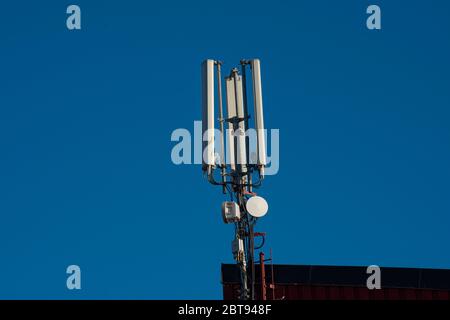 Antennas for mobile telecommunications on a building. Stock Photo