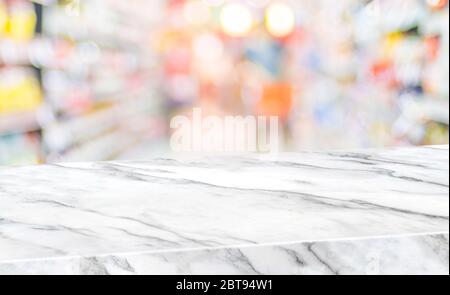 marble diagonal table with people shopping food at supermarket blur background.Mock up  banner for display of product at grocery bokeh backdrop Stock Photo