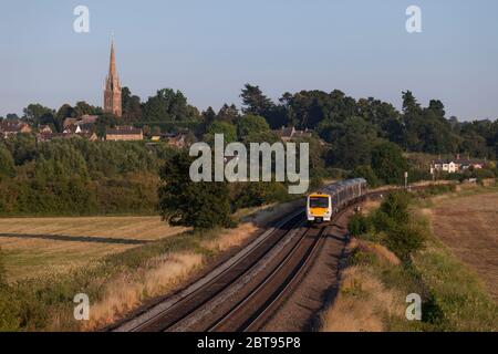 3 Chiltern railways class 172 trains passing Kings Sutton (South of Banbury) with a Chiltern railways mainline express train Stock Photo