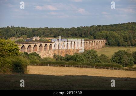 Northern rail class 150 sprinter train + class 144 pacer train crossing the long  Crimple valley viaduct (south of Harrogate) Stock Photo