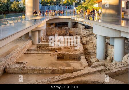 Athens, Attica / Greece - 2018/03/30: Archeological excavation site under main entrance to Acropolis Museum - Mouseio Akropolis - in ancient old town Stock Photo