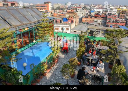 Kathmandu, Nepal - 2 February 2020: customers of a rooftop restaurant at Kathmandu on Nepal Stock Photo