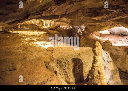 A visit to the stalactite cave in Ibiza that was used by smugglers at he time. Stock Photo