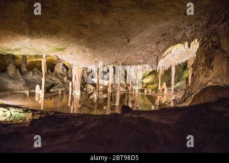 A visit to the stalactite cave in Ibiza that was used by smugglers at he time. Stock Photo