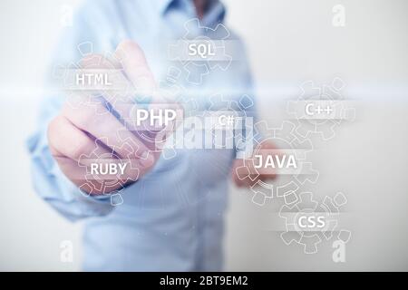Web development tools concept on virtual screen. Programming language and scripts. PHP, SQL, HTML, Java and others Stock Photo