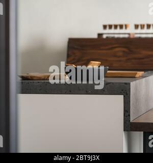 Modern minimalistic kitchen interior with concrete terrazzo countertop Stock Photo