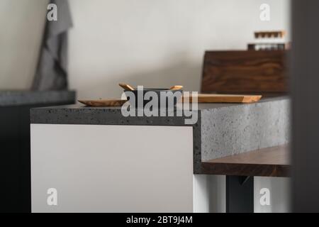 Modern minimalistic kitchen interior with concrete terrazzo countertop Stock Photo