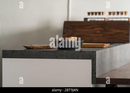 Modern minimalistic kitchen interior with concrete terrazzo countertop Stock Photo