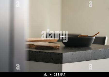 Modern minimalistic kitchen interior with concrete terrazzo countertop Stock Photo