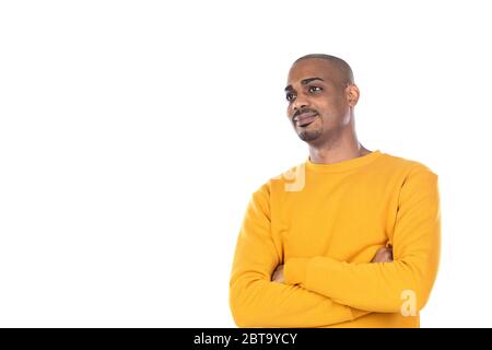 Afroamerican guy wearing a yellow jersey isolated on a white background Stock Photo