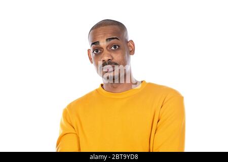 Afroamerican guy wearing a yellow jersey isolated on a white background Stock Photo