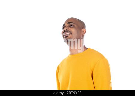 Afroamerican guy wearing a yellow jersey isolated on a white background Stock Photo